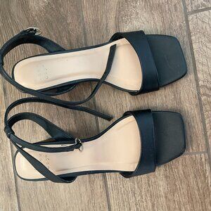 black leather heels with open toe